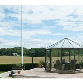 12-kantede Rondo drivhus/lysthus, giver et let og luftigt indtryk.